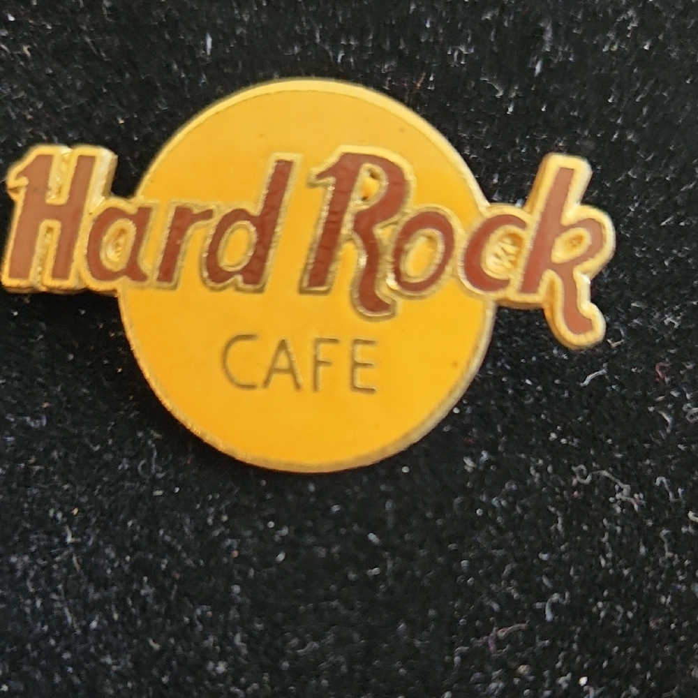 Vintage Hard Rock Cafe Yellow and Brown Emblem